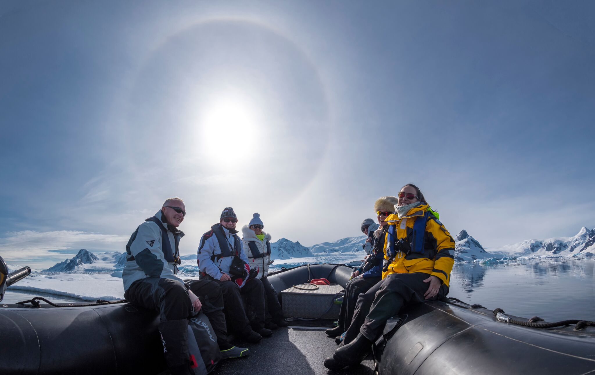 people heading ashore on a zodiac in the antarctic