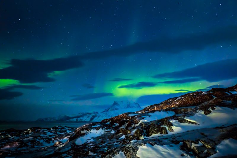 Northern Lights over the fjord in Greenland
